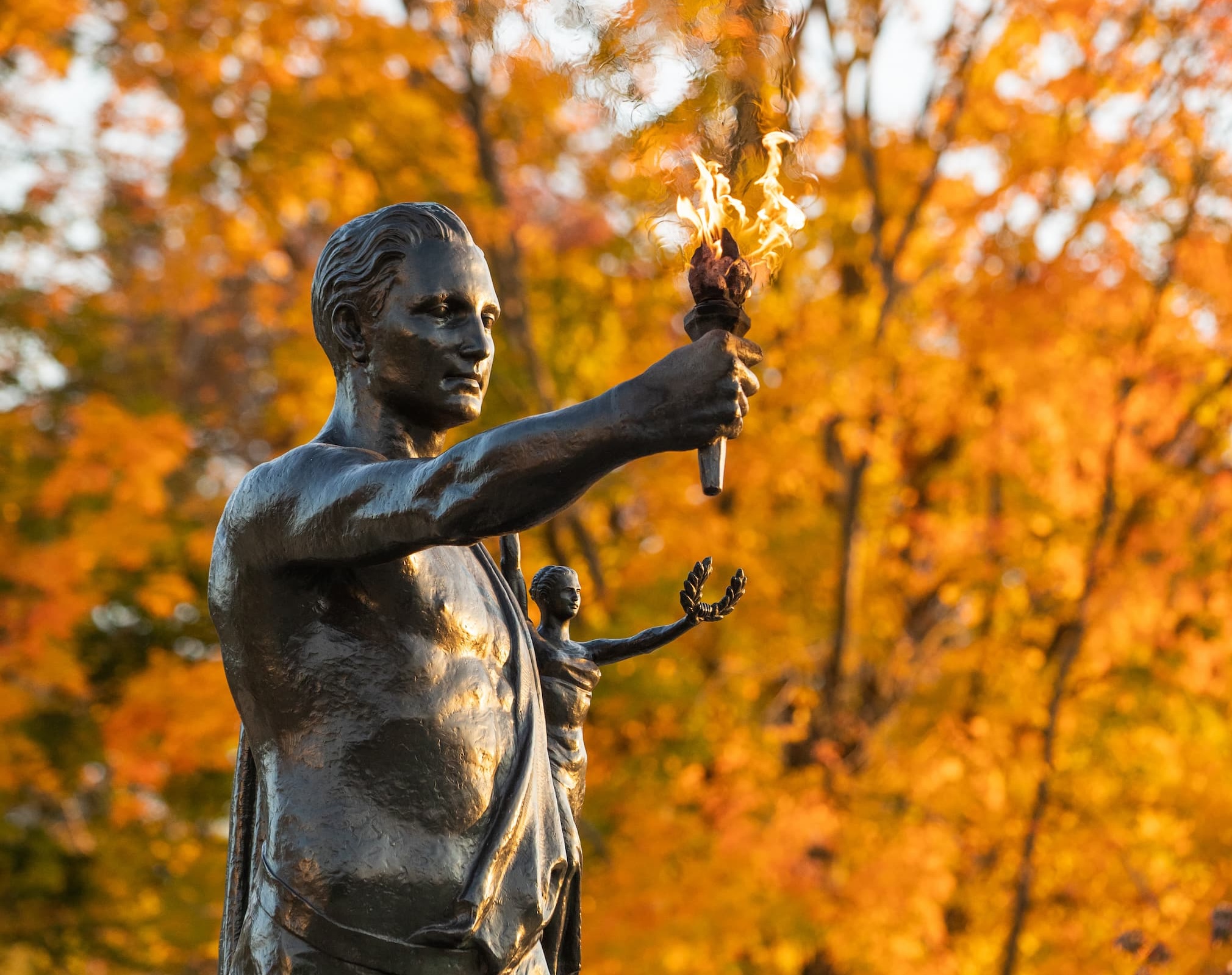 The Torchbearer statue in the fall.